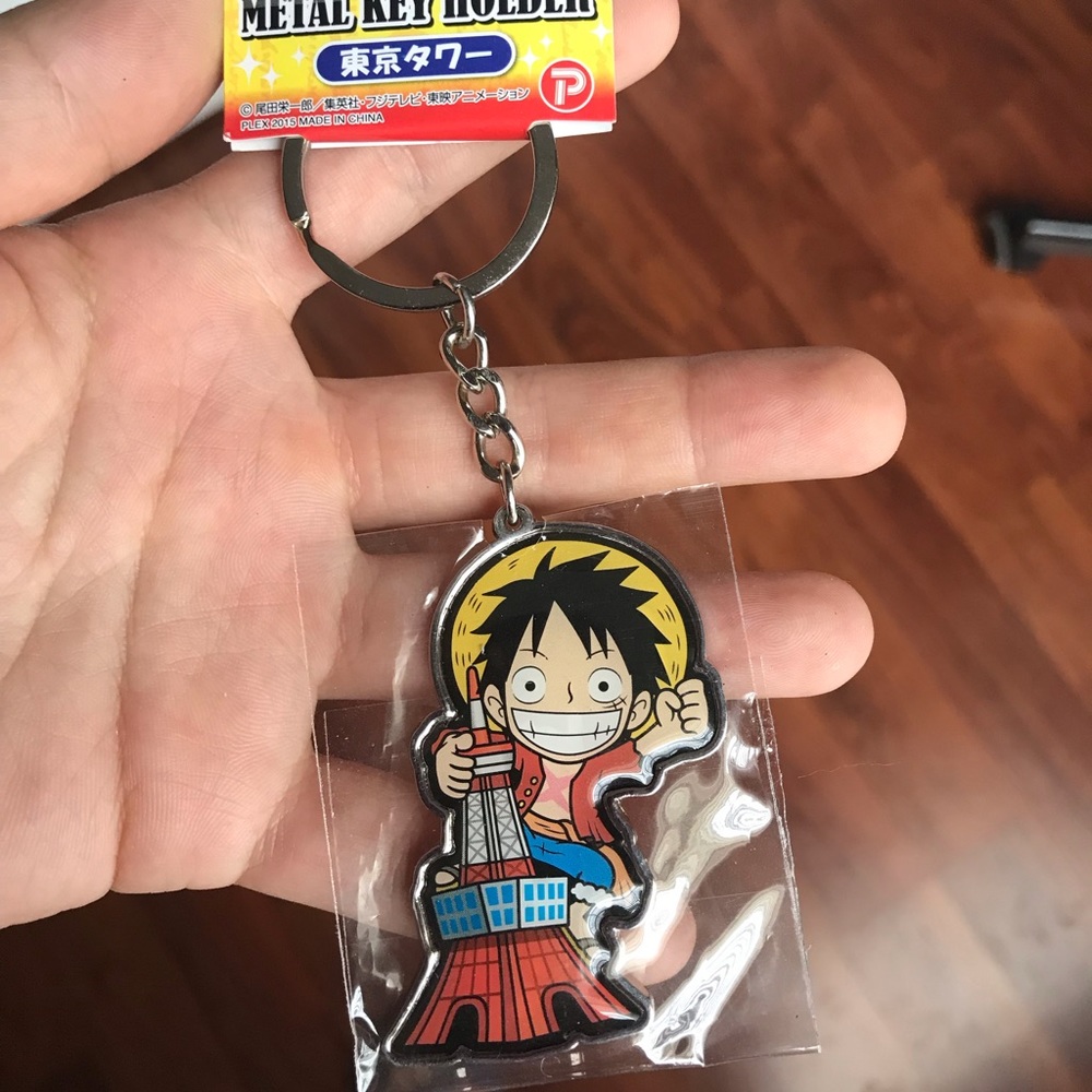 One piece metal keychain. NWT